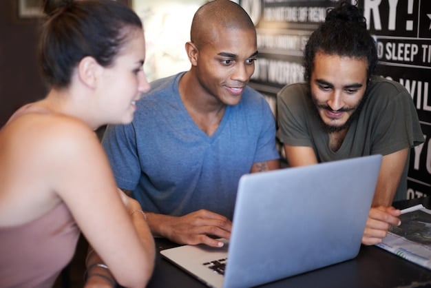 A diverse group of people participating in a job training program, learning new skills related to technology and automation.