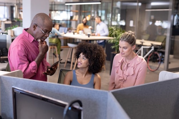 A diverse group of employees working together in a modern office setting, highlighting inclusivity and equal opportunities. Each person is smiling and engaged, indicating a positive and supportive work environment.