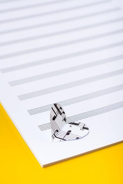 An image of a contract with a pen lying on top, symbolizing negotiations and legal agreements in the music industry. The focus is on the fine print and the importance of understanding contracts.