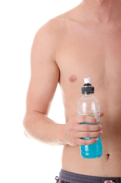 A close-up of an athlete's hand holding a water bottle, symbolizing awareness and caution regarding ingested substances. The background is blurred to keep the focus on the central message of vigilance.