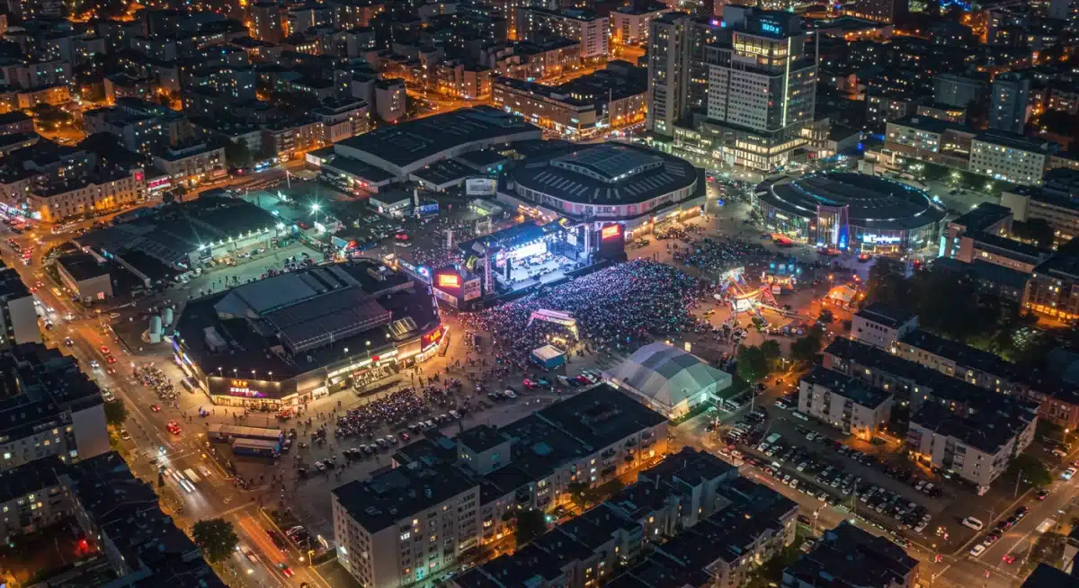 City nightlife with illuminated entertainment venues, showcasing economic impact.